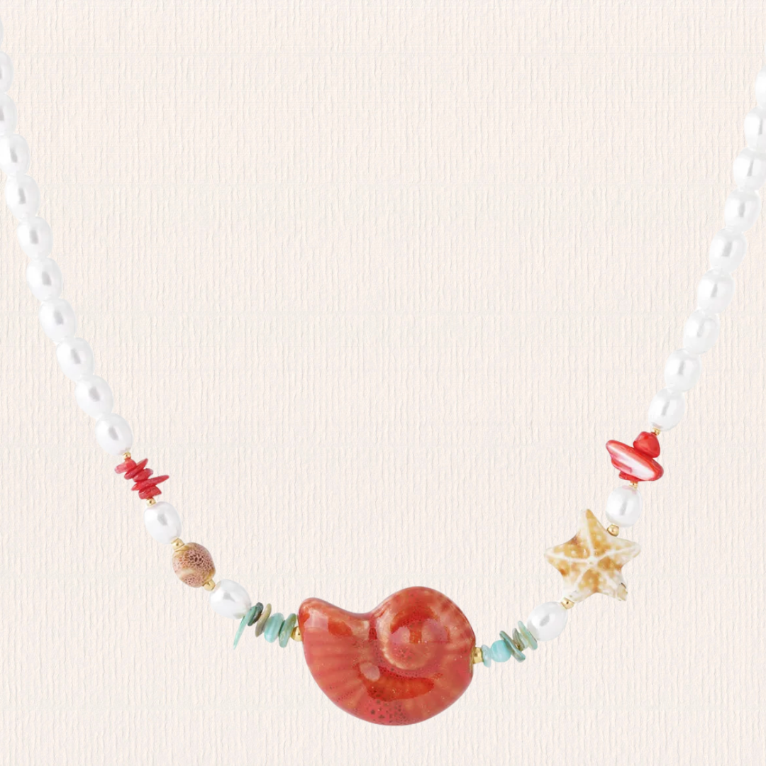 Parelketting met schelpen