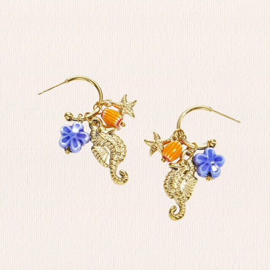 Gouden oorringen met zeepaardje