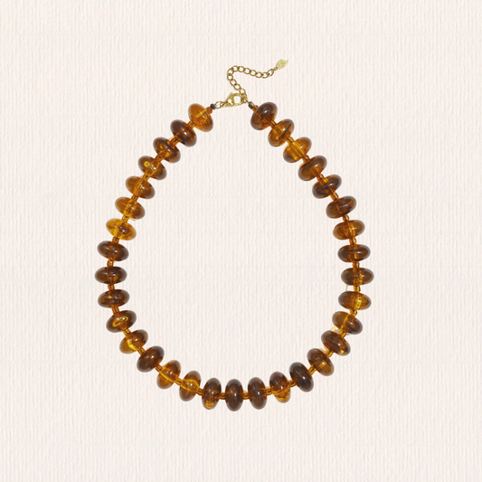 Acryl kralenketting bruin ovaal