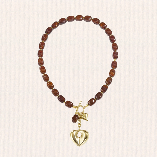 Bruine kralenketting met hart