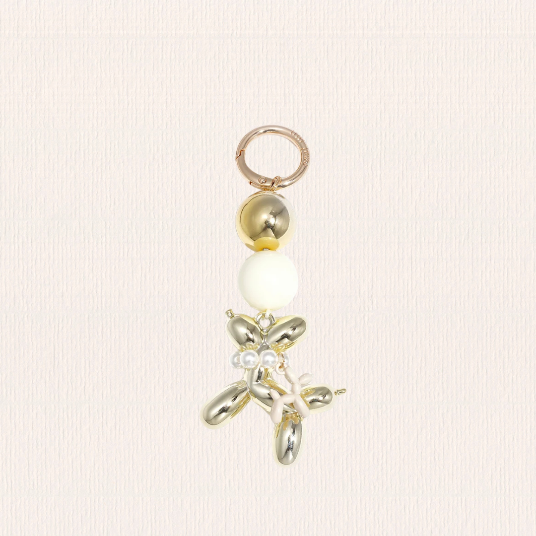 Tasbedeltje met balonhondje wit