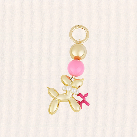 Tasbedeltje met dubbel balonhondje