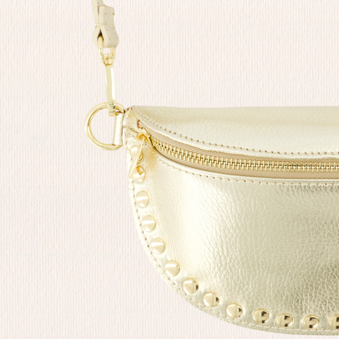 Leren heuptas met studs goud