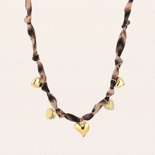 Panterprint ketting met hartjes
