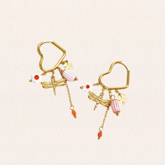 Hartjes creolen met roze hangertjes