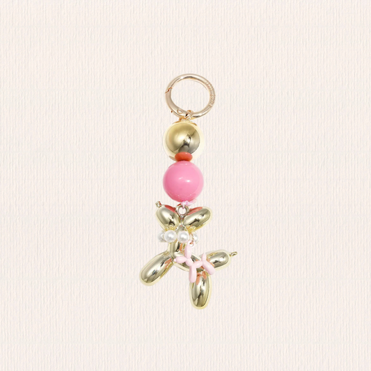 Tasbedeltje met balonhondje roze